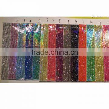 PU glitter artificial leather for garment laser shiny coated pu leather                        
                                                                                Supplier's Choice