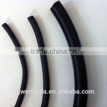 Corrosion resistant large diameter corrugated plastic pipe automotive wiring harness