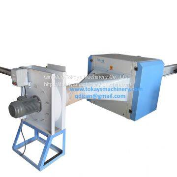 Fiber opening and pillow filling machine with single nozzle