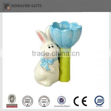 Colorful porcelain Easter rabbit statue with flower