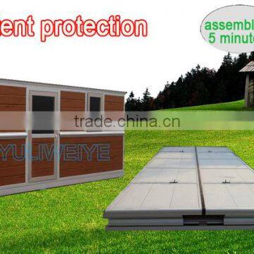 Compressible folding container house