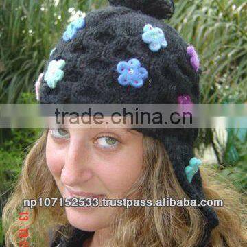 woolen ear hat in this model with flower price 230rs $2.70