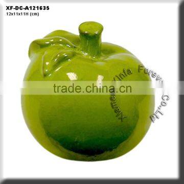 green ceramic apple figurine