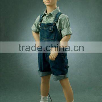 Christmas window display dress up realistic children mannequins