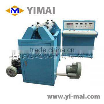 Plastic film slitting and rewinder machine