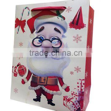 Santa shopping paper bag with satin ribbon