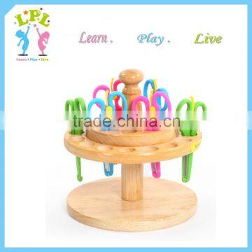 Wholesale factory sale high quality solid wood wooden scissors display rack for kids