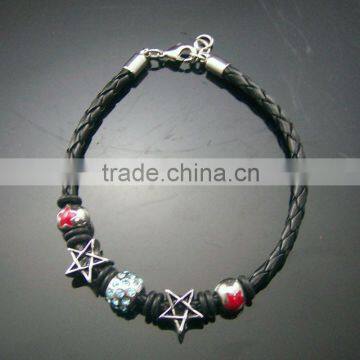 Handmade briaded leather bracelet with charm