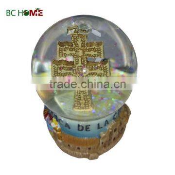 Customized small size religious resin snow globe