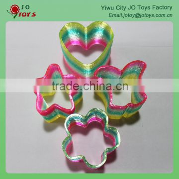 Various shapes plastic rainbow spring toys