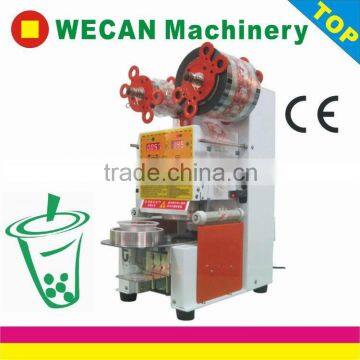 Hot selling fully automatic cup sealer packing machine packaging machinery of sales