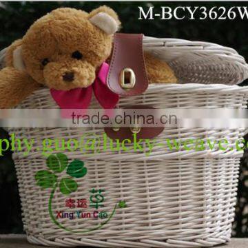 white wicker bicycle basket with handle