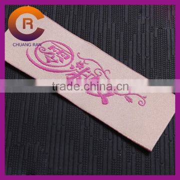 Pink color custom logo made cheap woven garment labels