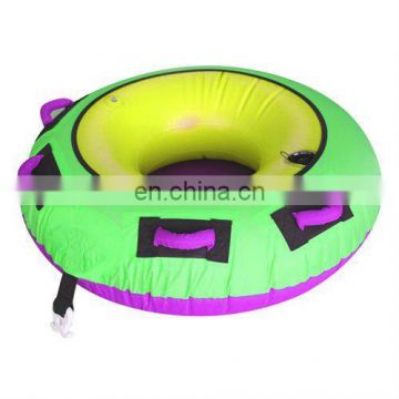 Inflatable towable water tube with nylon cover