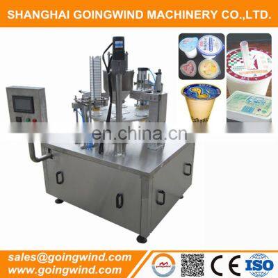 Auto jelly jam yogurt cup packaging machine small automatic rotary filler and sealer machinery cheap price for sale