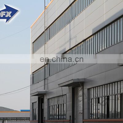 Qingdao low cost H beam prefab metal frame storage warehouse building