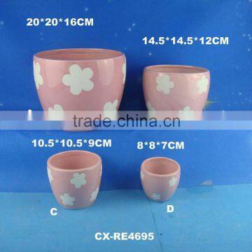 Light-colored indoor glazed ceramic plant pot