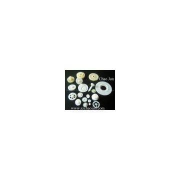Plastic gear and brass gear