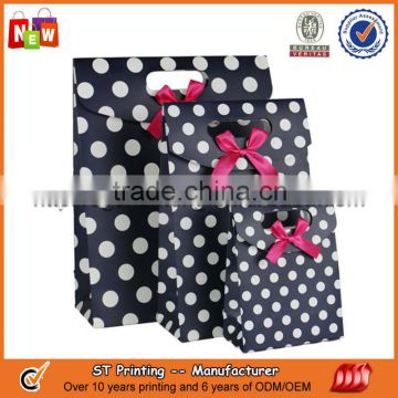 Pink kraft polka dot paper bag