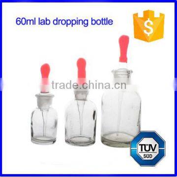 Lab glass dropping bottle with ground-in pipette and latex rubber nipple