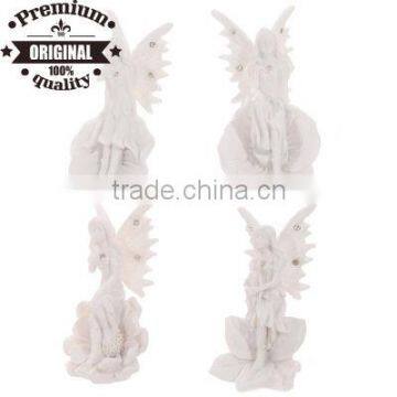 polyresin white flower fairy sitting on the head of flower