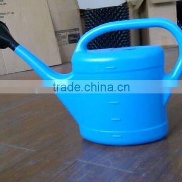 Blue plastic sprinkled kettle