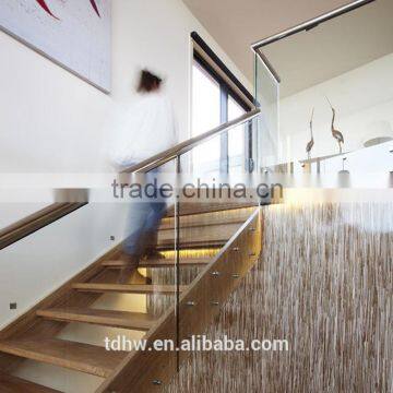 Glass balustrade for stairs with side mount stainless steel handrail