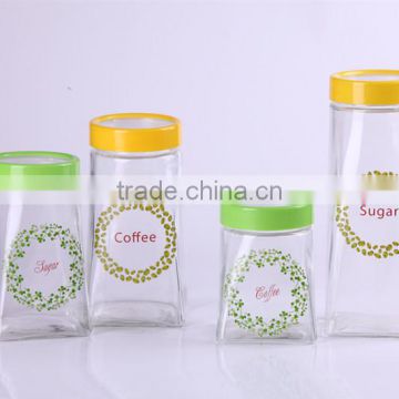 clear glass cansiter with decal