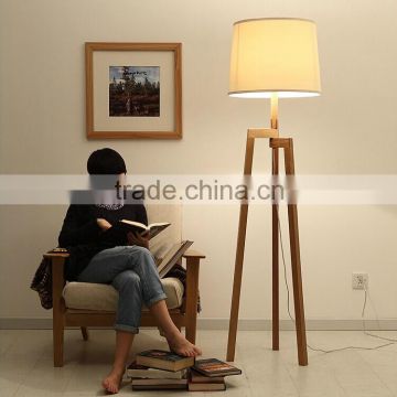 Wood Tripod Floor Lighting wooden tripod standing floor lamp with fabric lampshade