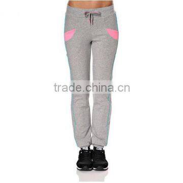 Cheap fashion girls fleece sports pants with slant pink pocket