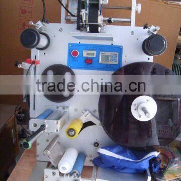 Semi-automatic round bottle labeling machine