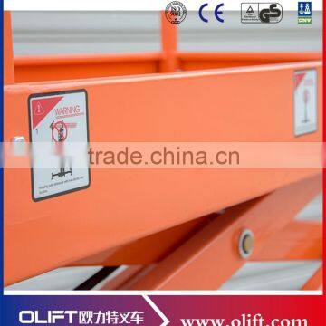 Four Wheels Mini Mobile Scissor Platform Lift From China photo-4