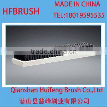 Bristle brush with PVC panel