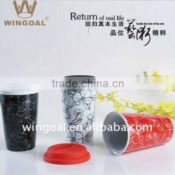 Double wall ceramic travel mug with silicon lid