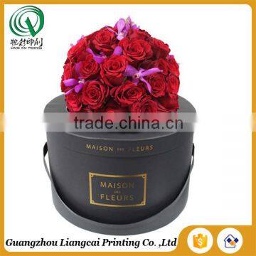 Black hot logo stamping custom cylindrical flower paper canister packaging round canister                        
                                                Quality Choice
