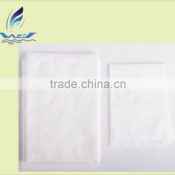 disposable face towel with embossing for traving