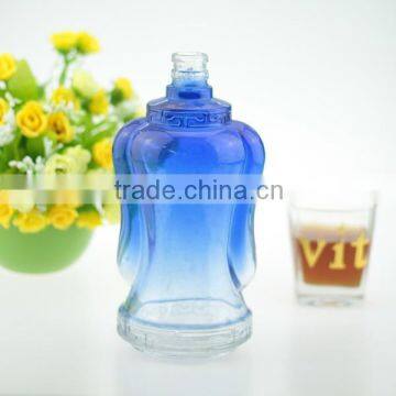 Transparent clear empty glass bottle clear liquor bottle blue color glass bottle wholesale