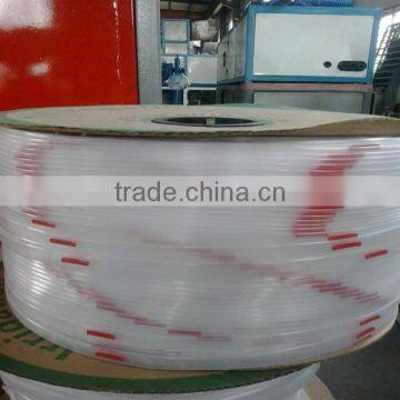 Plastic inlaid flat emitter drip irrigation tape machine with high efficiency