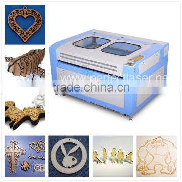 Leather/fabric/ crystal/rubber/ plastic 6090 cheap co2 mini laser engraving and cutting machine price