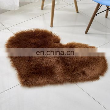 brown color hear shape living room faux fur rug