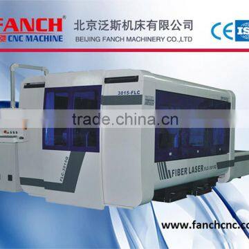 3000W fiber laser cutting machine 3015 for metal with exchangeable table & fully protective shield