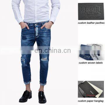 Glam head jeans distressed worn-out look ripped tight bottom denim pants your own brand jeans manufacturer