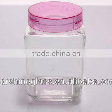 glass storage jar with iron cover