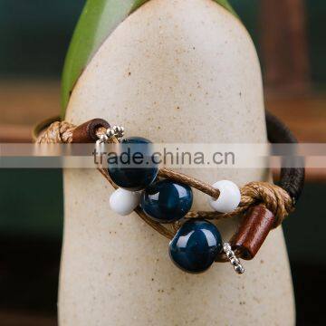 green porcelain beads bracelet with adjustablt length                        
                                                                                Supplier's Choice