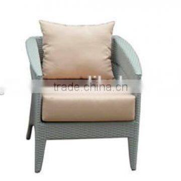 rattan chair with cushion and pillow