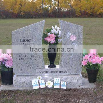 grey memorial with flower