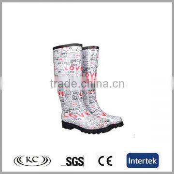 newspaper design women monogrammed rain boots