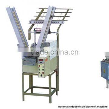 Automatic double spindle weft machine with big bobbin