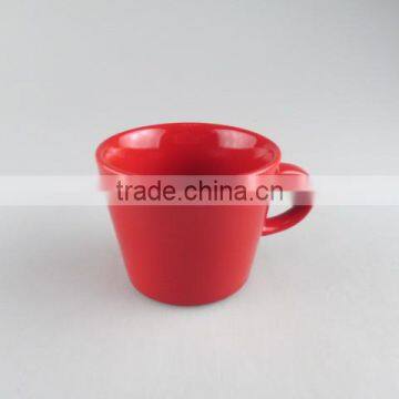 round ceramic red-glazed coffee cup