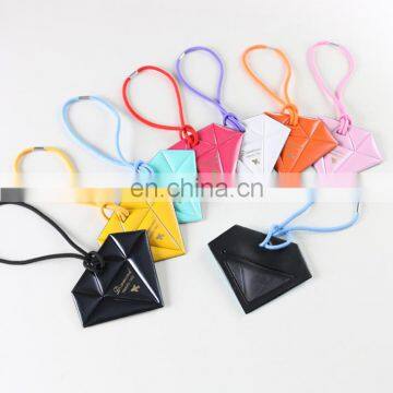 Wholesale Promotion Airline Souvenir Gold Stamped Custom Diamond Shape Pvc Luggage Tag With Elastic String